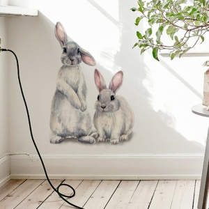 Décoration murale de deux lapins mignons pour filles avec un fond blanc
