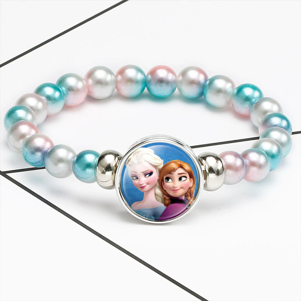 Bracelet en perles roses et bleues avec ornement princesses Elsa et Anna