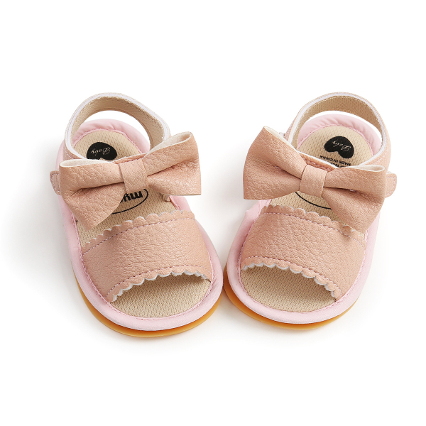 Sandale pour enfant rose avec nœud papillon