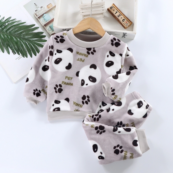 Pyjama d'hiver polaire à motif panda gris avec un fond blanc et des livres