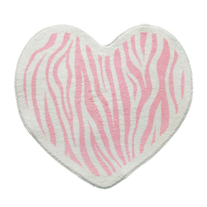 Un tapis pour chambre de fille de couleur blanc et rose en forme de cœur, il a un motif zébré.