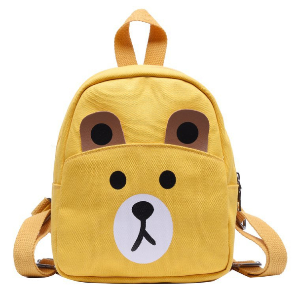 Un sac à dos jaune avec un visage mignon d'ourson pour fille. Le visage d'animal est de couleur blanche et marron. Il a une hanse sur le dessus et deux bandoulières à l'arrière.