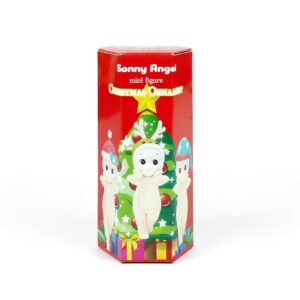 Blind box figurine style Sonny Angel édition Noël, la boîte est rouge avec un sapin de Noël et les dessins des figurines.